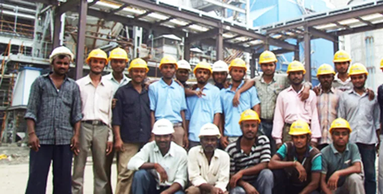 Facility workforce assembled at an industrial site