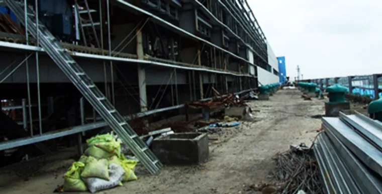 Structural steel erection in progress at a power plant site